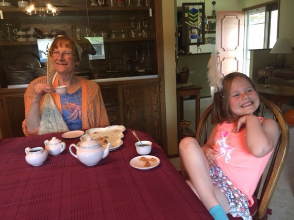 woman and girl tea party