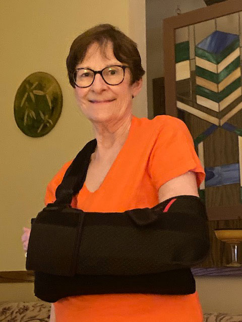 woman with arm in sling